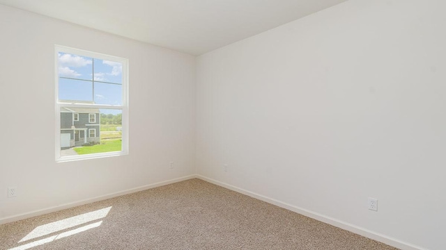 view of carpeted spare room