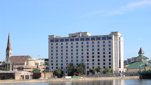 view of building exterior featuring a water view