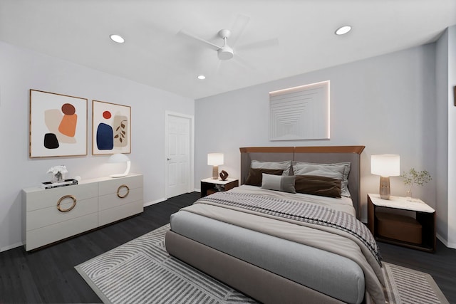 bedroom featuring dark hardwood / wood-style floors and ceiling fan