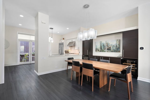 dining space with dark hardwood / wood-style floors