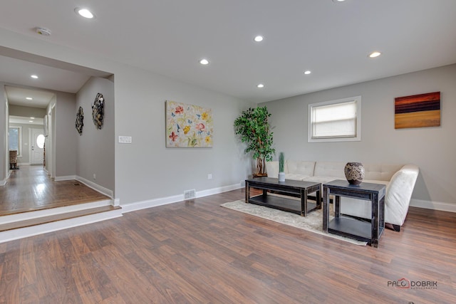 sitting room with hardwood / wood-style floors