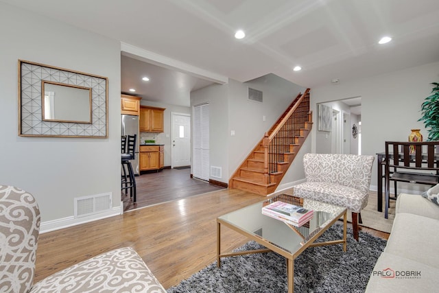 living room with dark hardwood / wood-style flooring