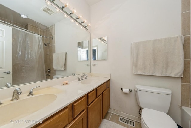 full bath featuring visible vents, a sink, and toilet