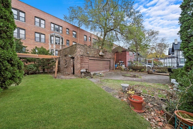 view of yard with a garage