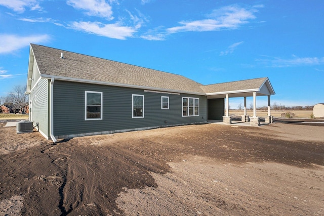 back of property featuring a patio and central AC unit