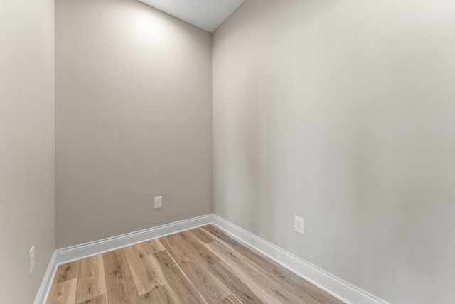 spare room with light hardwood / wood-style flooring