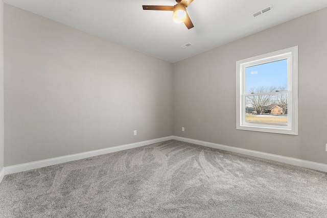 unfurnished room with carpet floors and ceiling fan