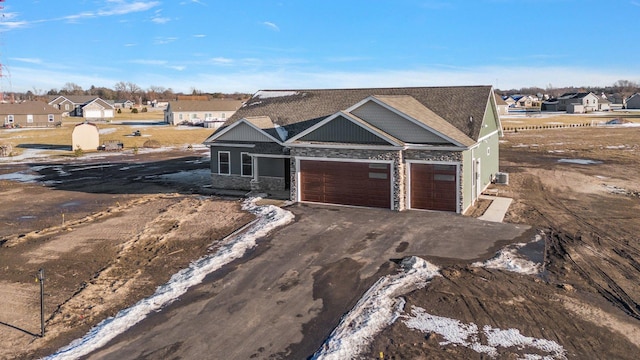 view of front of home featuring a garage