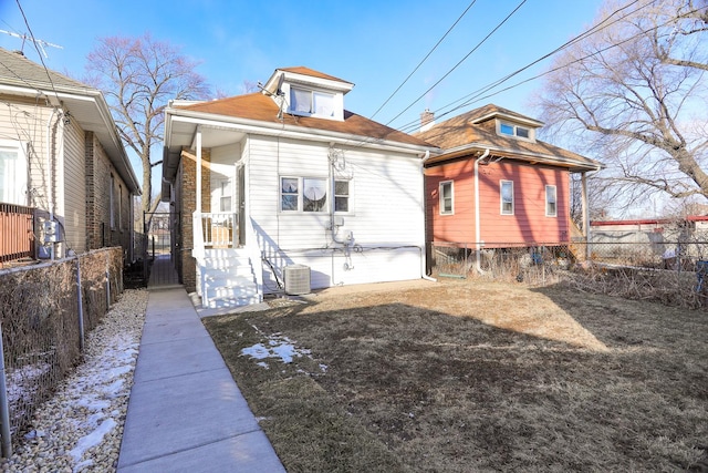 back of house featuring central AC