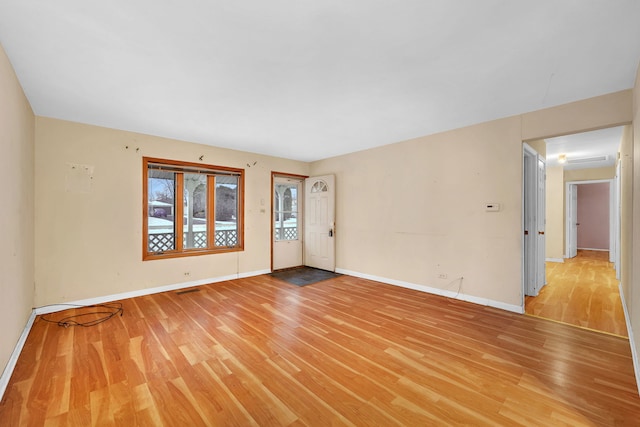 empty room featuring light hardwood / wood-style floors