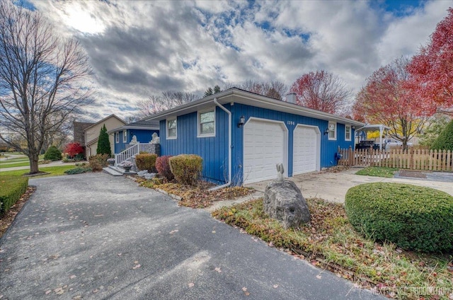 view of front of house with a garage