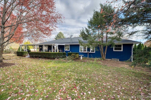 view of front of home with a front yard