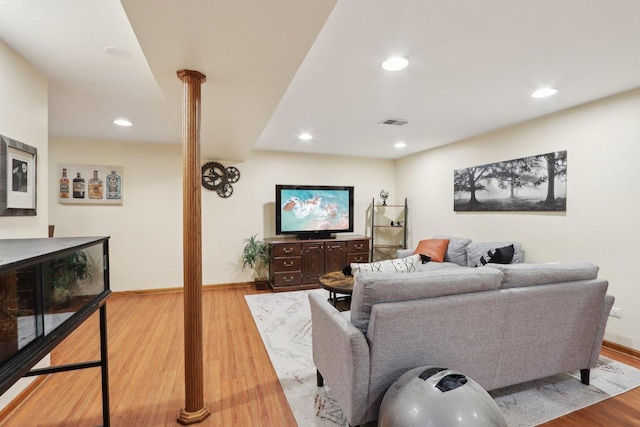 living room with light hardwood / wood-style floors