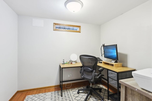 home office featuring hardwood / wood-style flooring