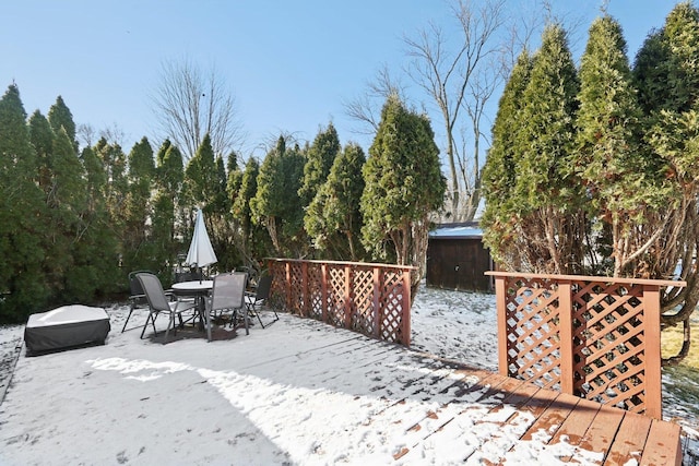 view of snow covered deck