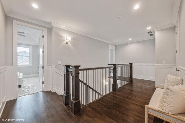 unfurnished dining area featuring plenty of natural light, dark hardwood / wood-style floors, and an inviting chandelier