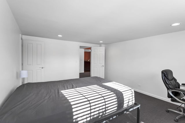 carpeted bedroom with baseboards and recessed lighting