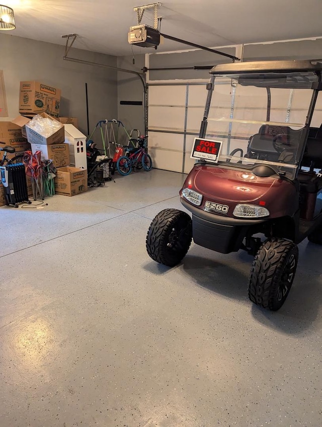 garage featuring a garage door opener