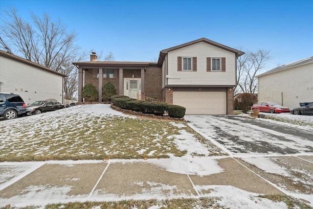 split level home with a garage