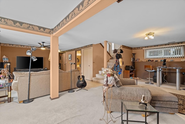 living room featuring light carpet, ceiling fan, and bar