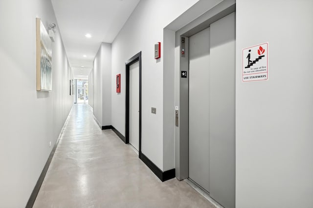 corridor featuring elevator