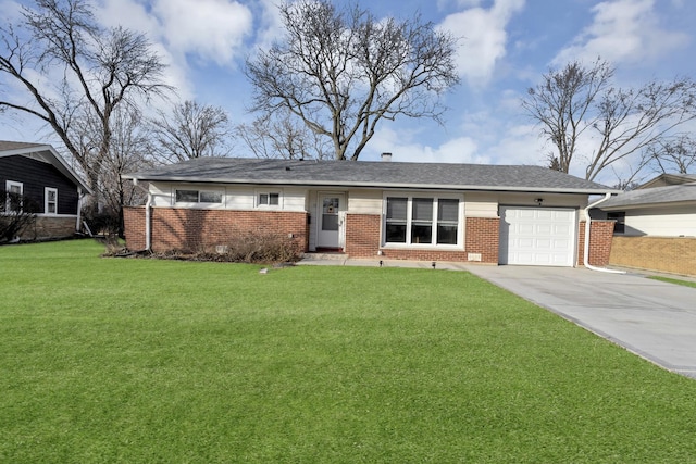 ranch-style house featuring a garage and a front lawn