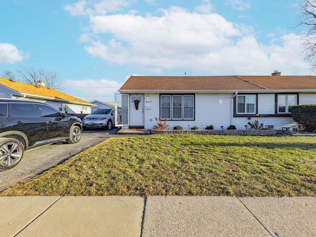 view of front of home with a front yard