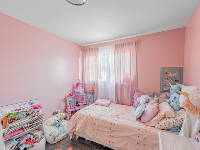 bedroom featuring wood-type flooring