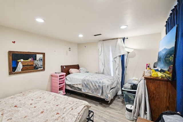 bedroom featuring light hardwood / wood-style floors