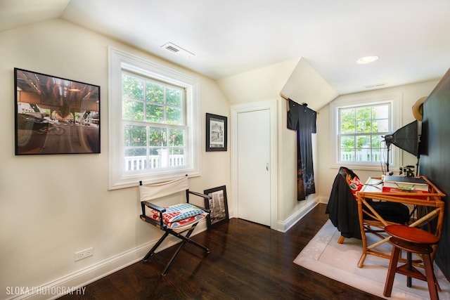 office featuring vaulted ceiling and dark hardwood / wood-style flooring