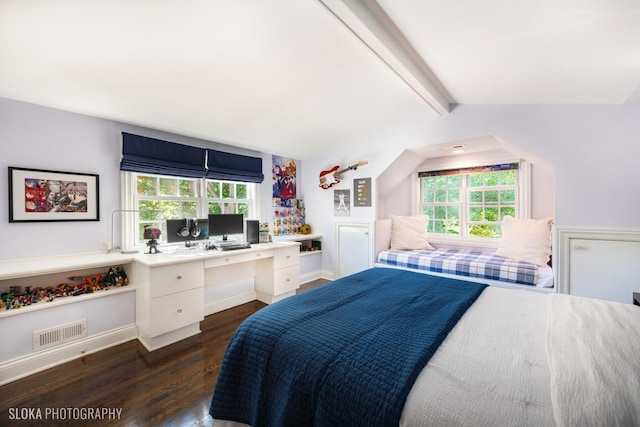 bedroom with dark hardwood / wood-style flooring, vaulted ceiling with beams, and built in desk