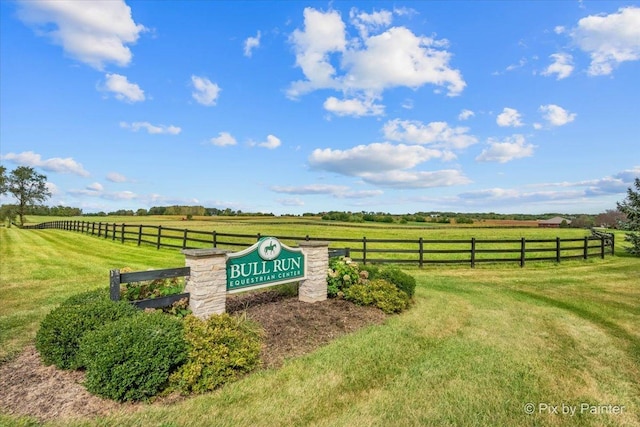 exterior space with a lawn and a rural view