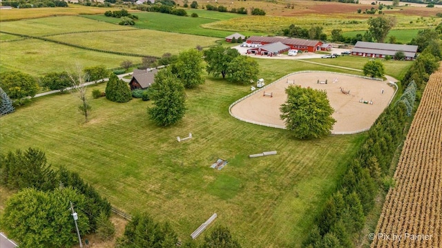 birds eye view of property featuring a rural view