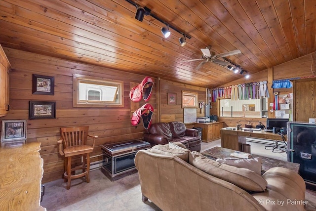 living room with a wealth of natural light, wooden ceiling, wooden walls, track lighting, and vaulted ceiling