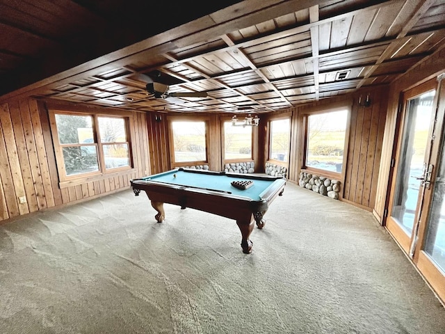 recreation room featuring light colored carpet, billiards, wood walls, and a healthy amount of sunlight