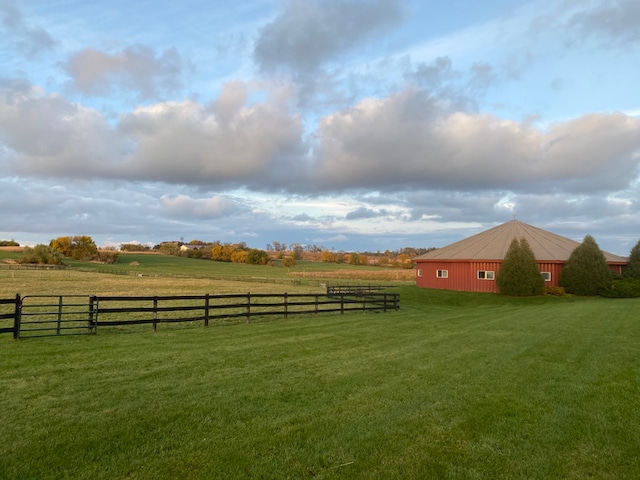 view of yard with a rural view