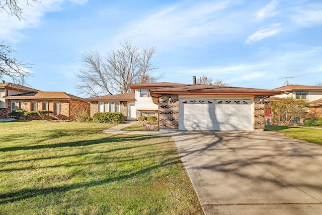 view of front facade with a garage and a front lawn