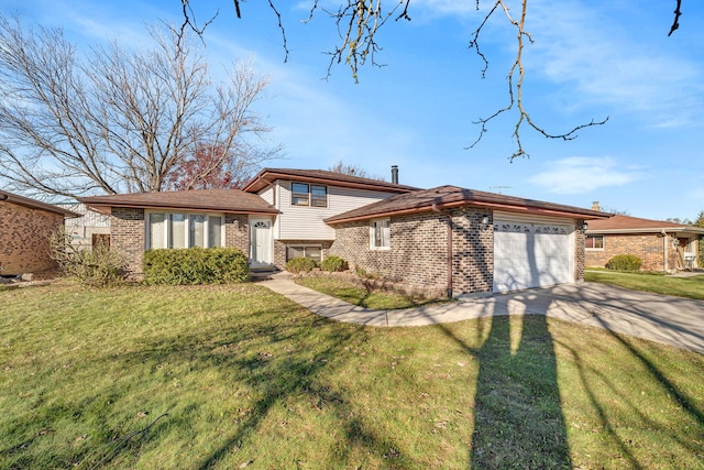 tri-level home featuring a garage and a front lawn