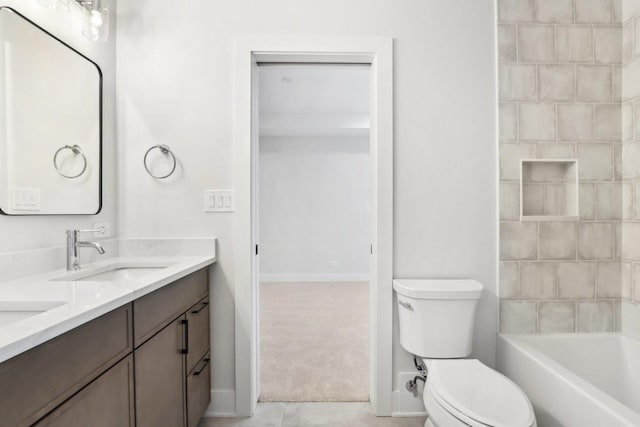 full bathroom with tile patterned flooring, vanity,  shower combination, and toilet