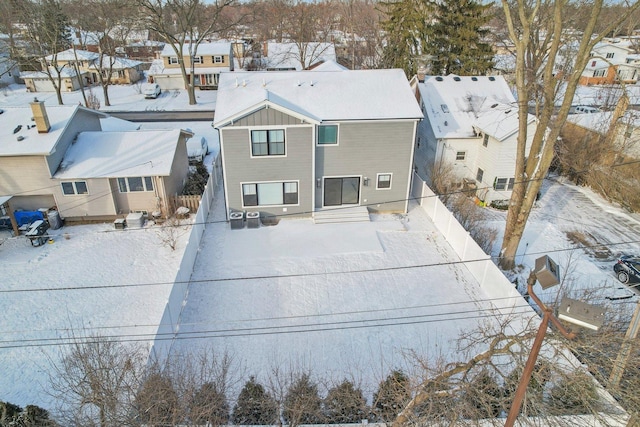 view of snow covered house