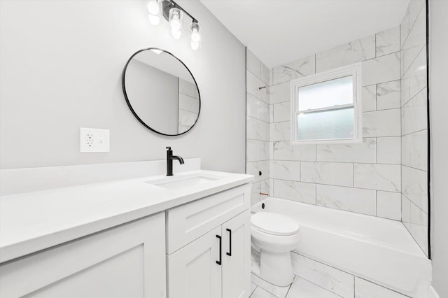 full bathroom with tiled shower / bath combo, toilet, and vanity