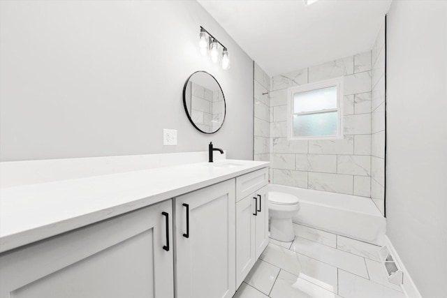 full bathroom with vanity, toilet, and tiled shower / bath combo