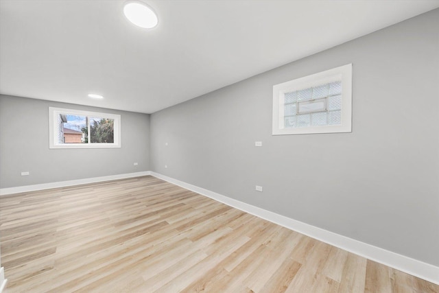 spare room featuring light hardwood / wood-style floors