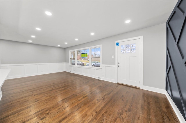 foyer with dark hardwood / wood-style flooring