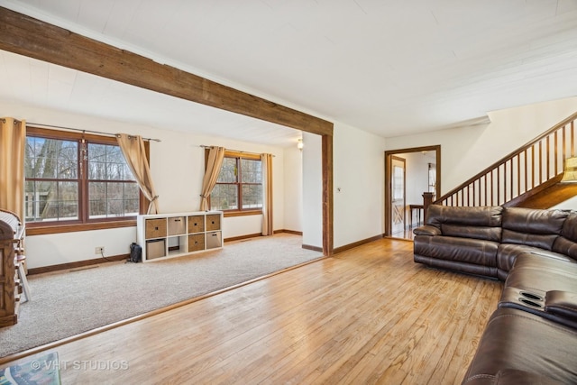 living room with light hardwood / wood-style flooring