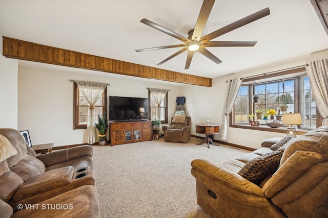 living room featuring ceiling fan, a healthy amount of sunlight, and carpet floors