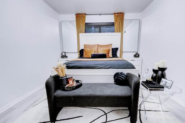 bedroom featuring light hardwood / wood-style floors