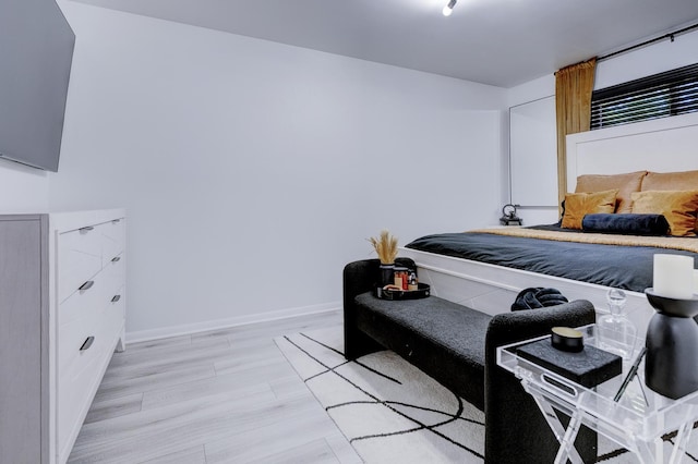 bedroom featuring light wood-type flooring