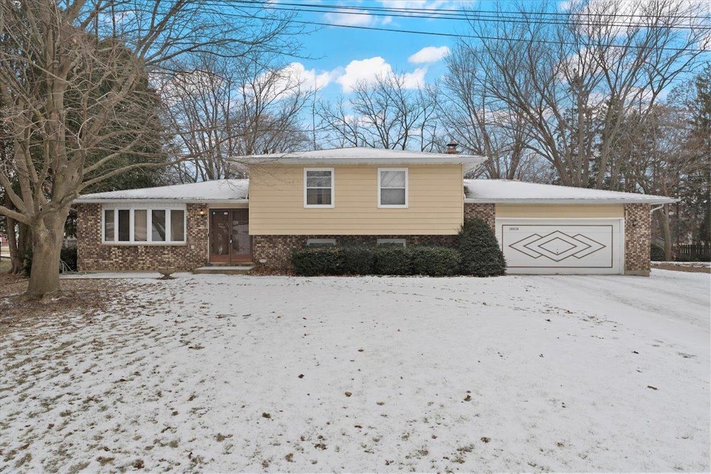 split level home with a garage