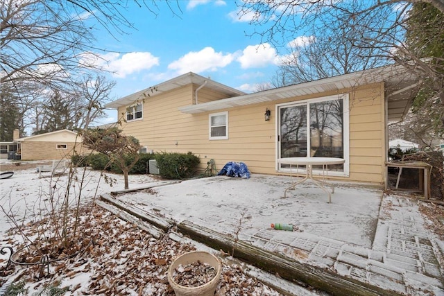 view of snow covered house